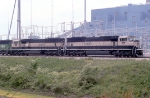 Back then brand new and clean SD70MAC leading coal train